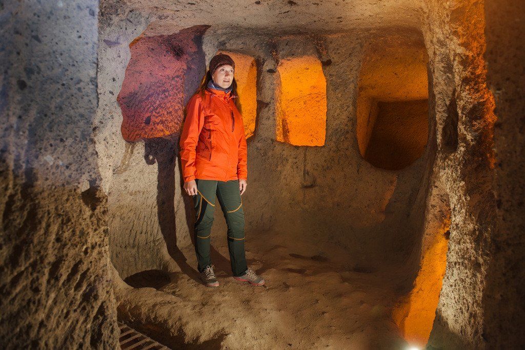 Woman Discovering Kaymakli Underground City